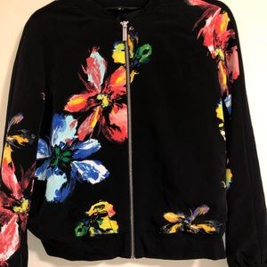 Multicolored rainbow and black bomber jacket